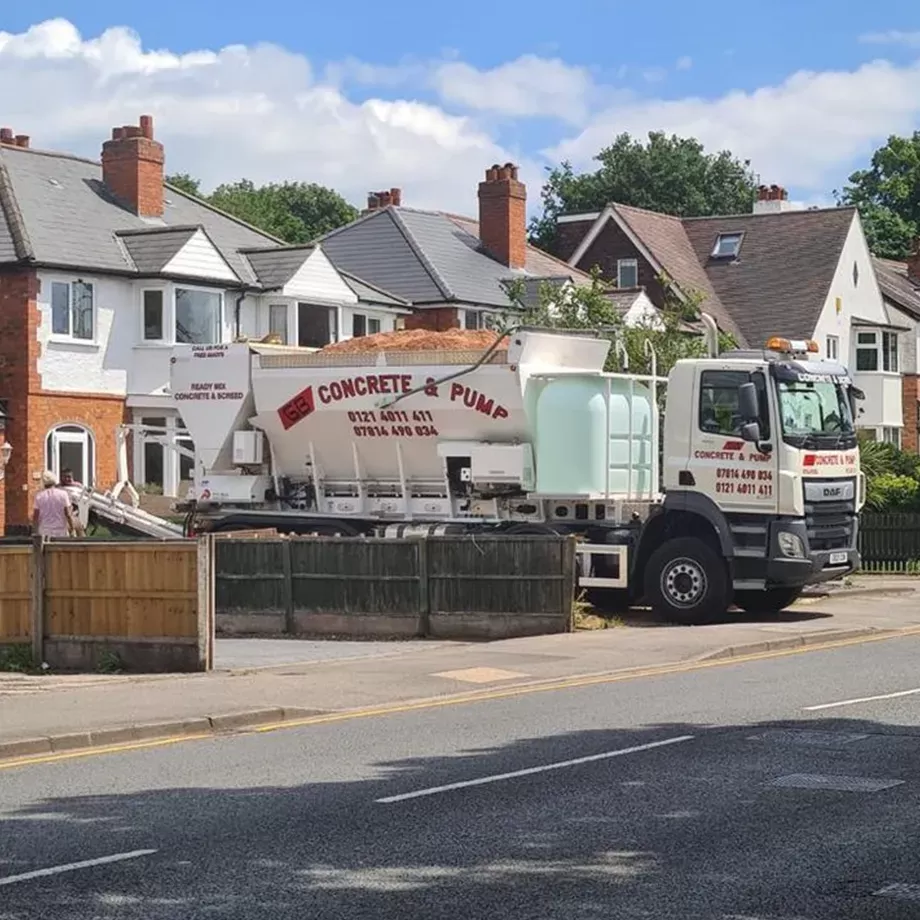 GB Concrete & Pump truck outside residential property