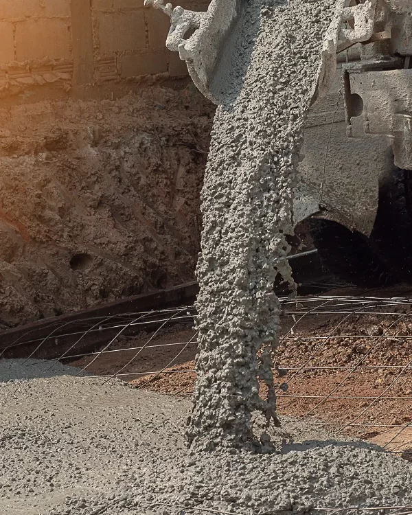 Ready mix concrete being poured from truck